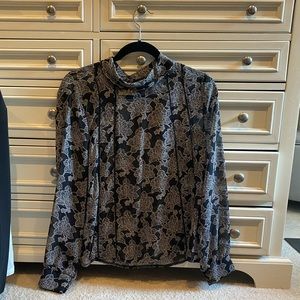 High neck, floral blouse